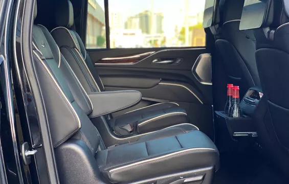 luxury Cadillac Escalade interior with cooled front seats and with additional rear passenger leg room