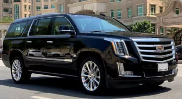 Stunning luxury Cadillac Escalade for rent with chauffeur, large black colour SUV, exterior view
