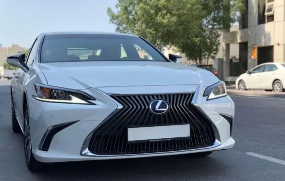 Stunning Luxury LEXUS ES 300H for rent with a driver, white colour, exterior front view